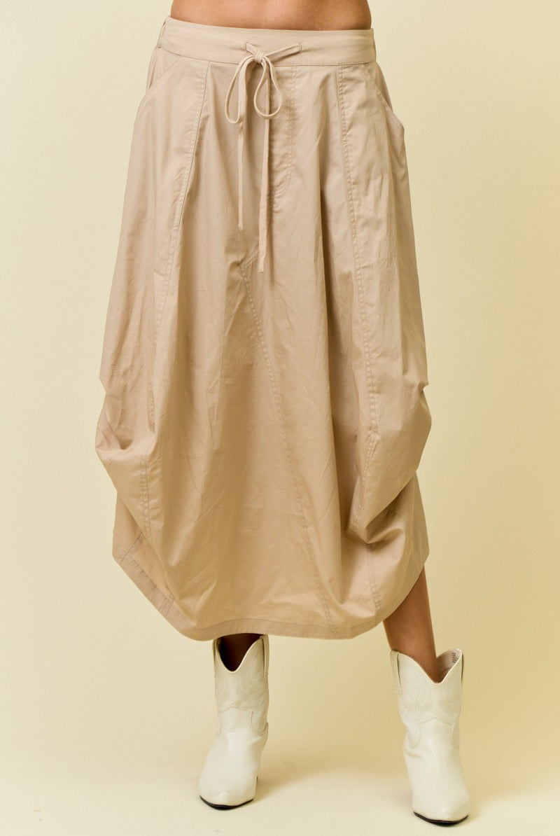 beige midi skirt with side tuck detail and drawstring waist