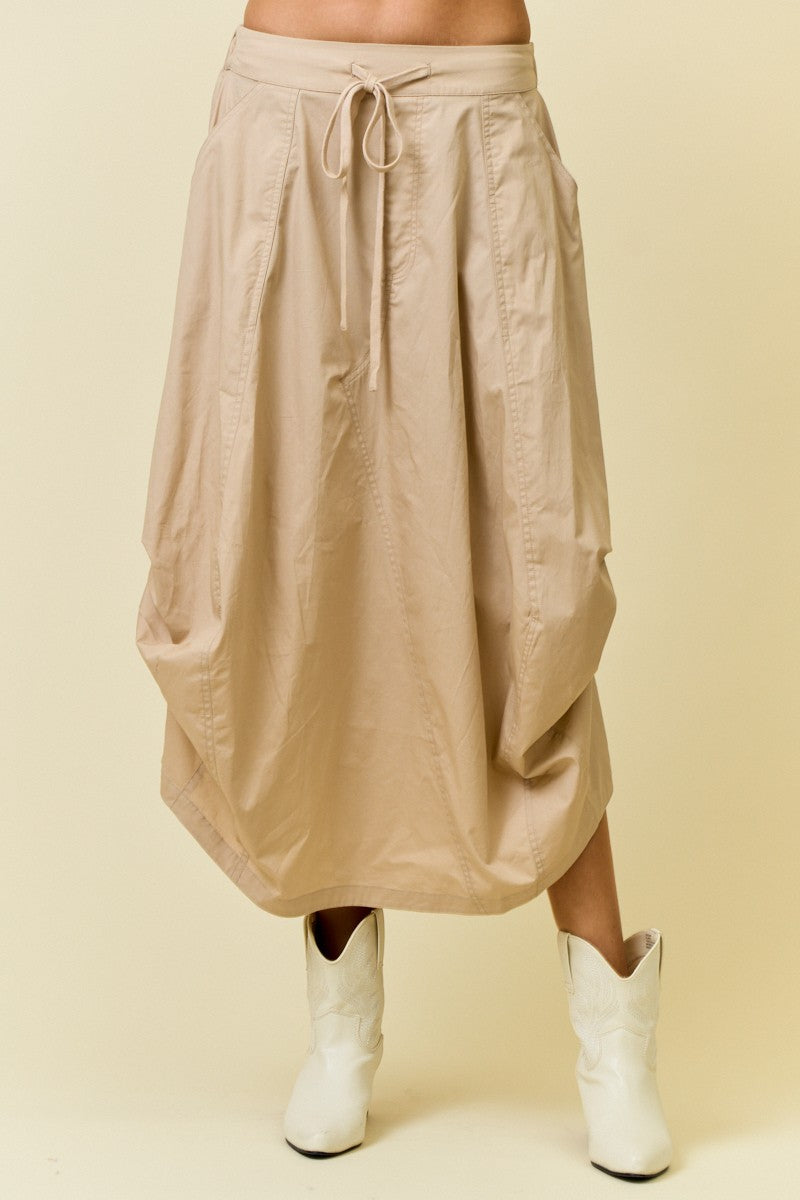 beige midi skirt with side tuck detail and drawstring waist