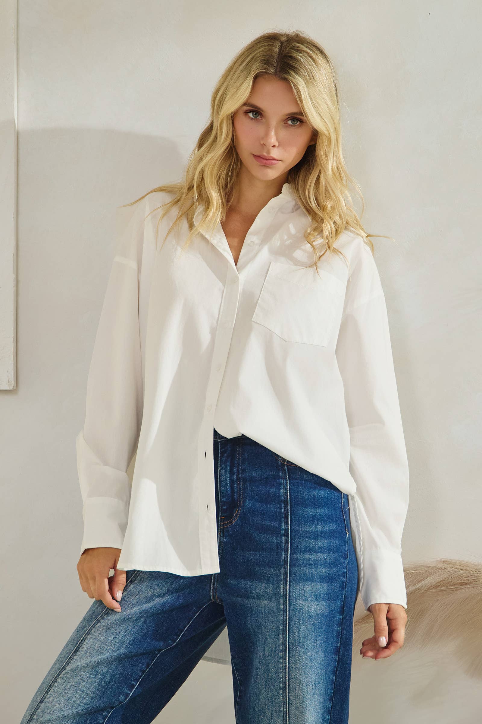 white button down long sleeve shirt, front patch pocket, high-low hem