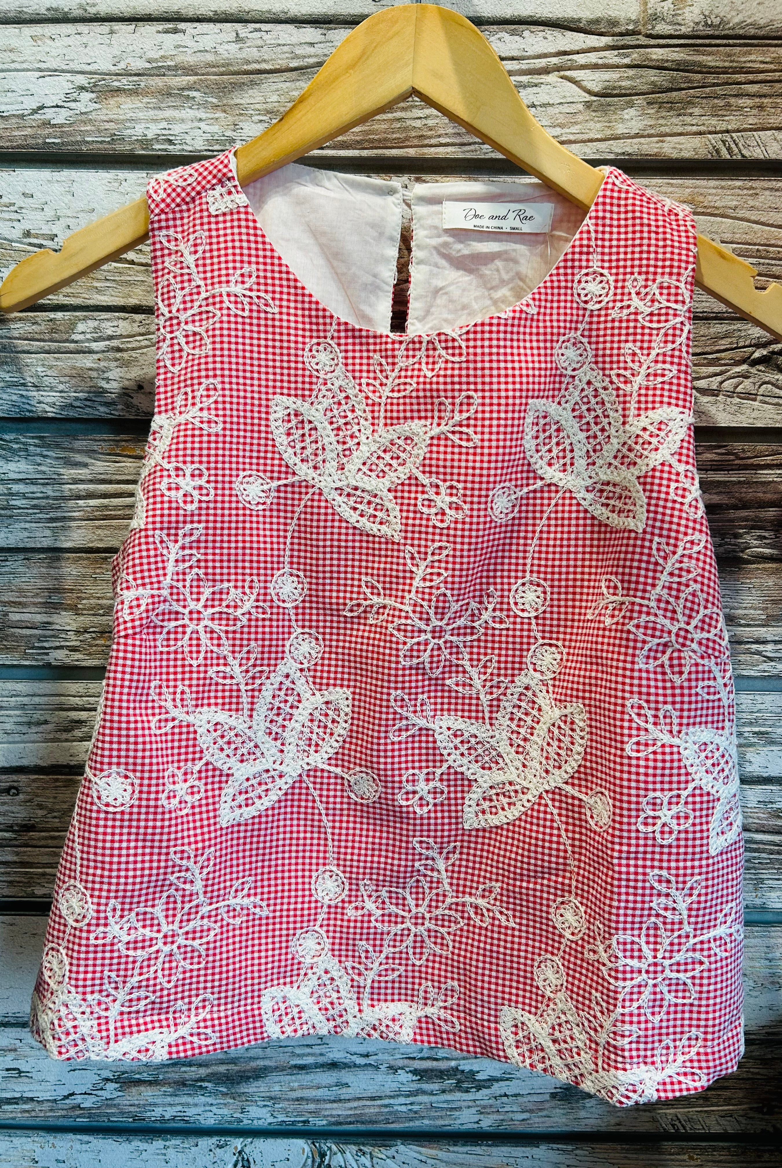 Red Sleeveless Gingham Blouse with White Flowers