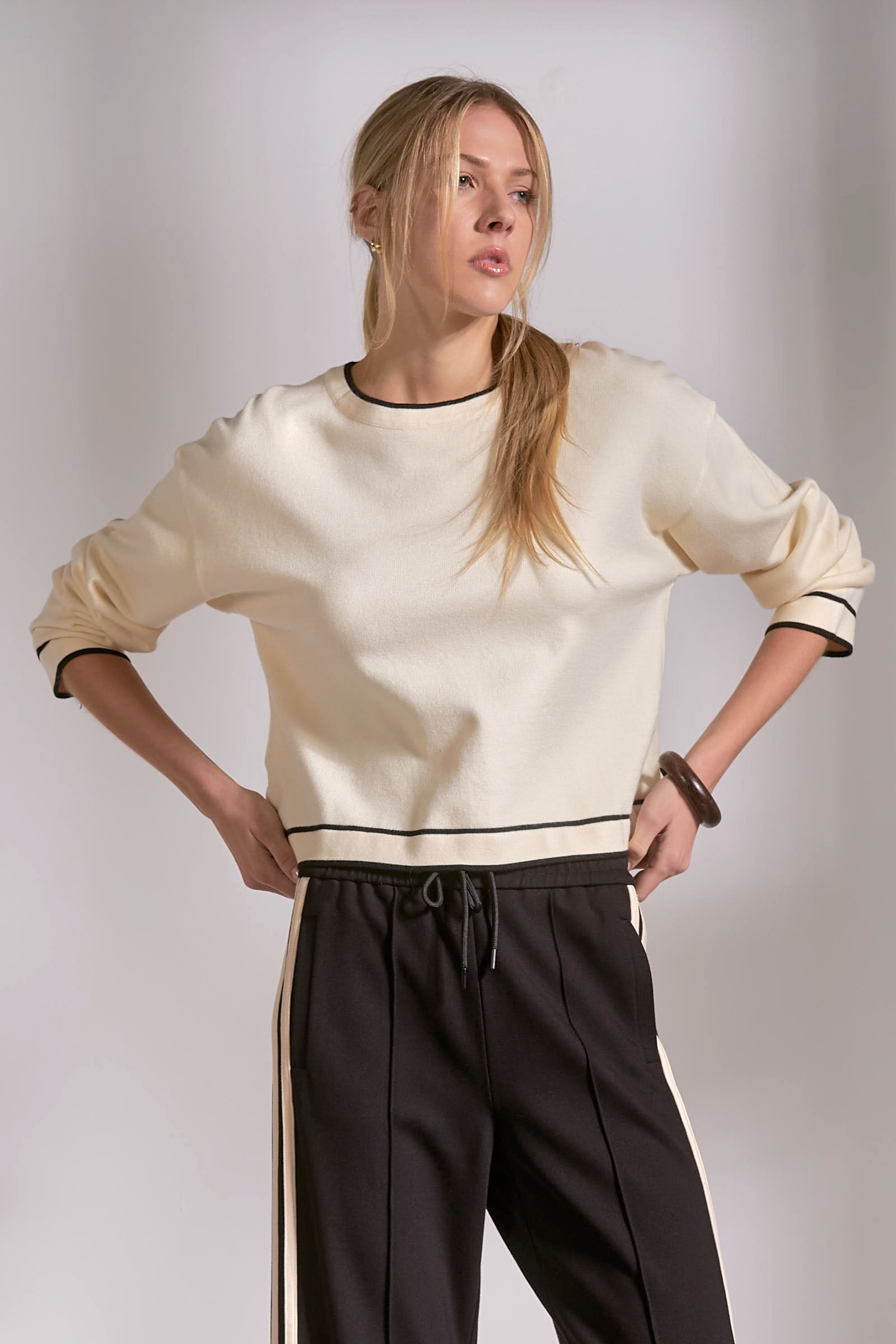 Off-White Sweater with Black Contrast Trim