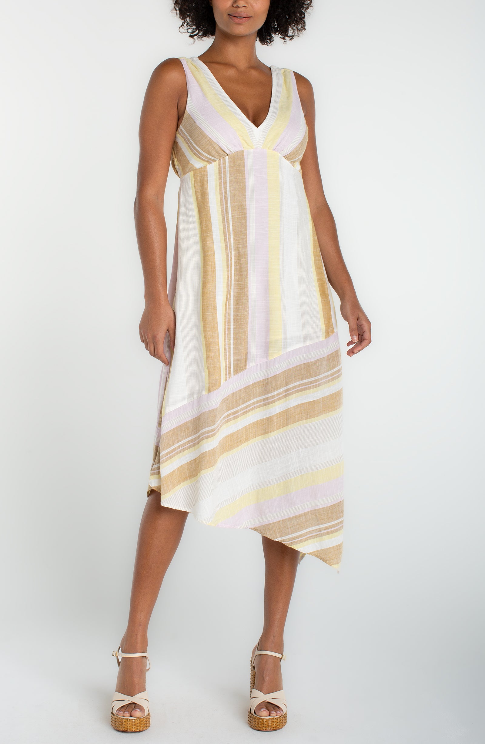 Liverpool sleeveless dress with vertical stripes and asymmetrical hem.