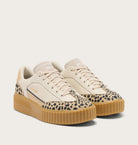 SOREL beige platform sneakers with animal print accents