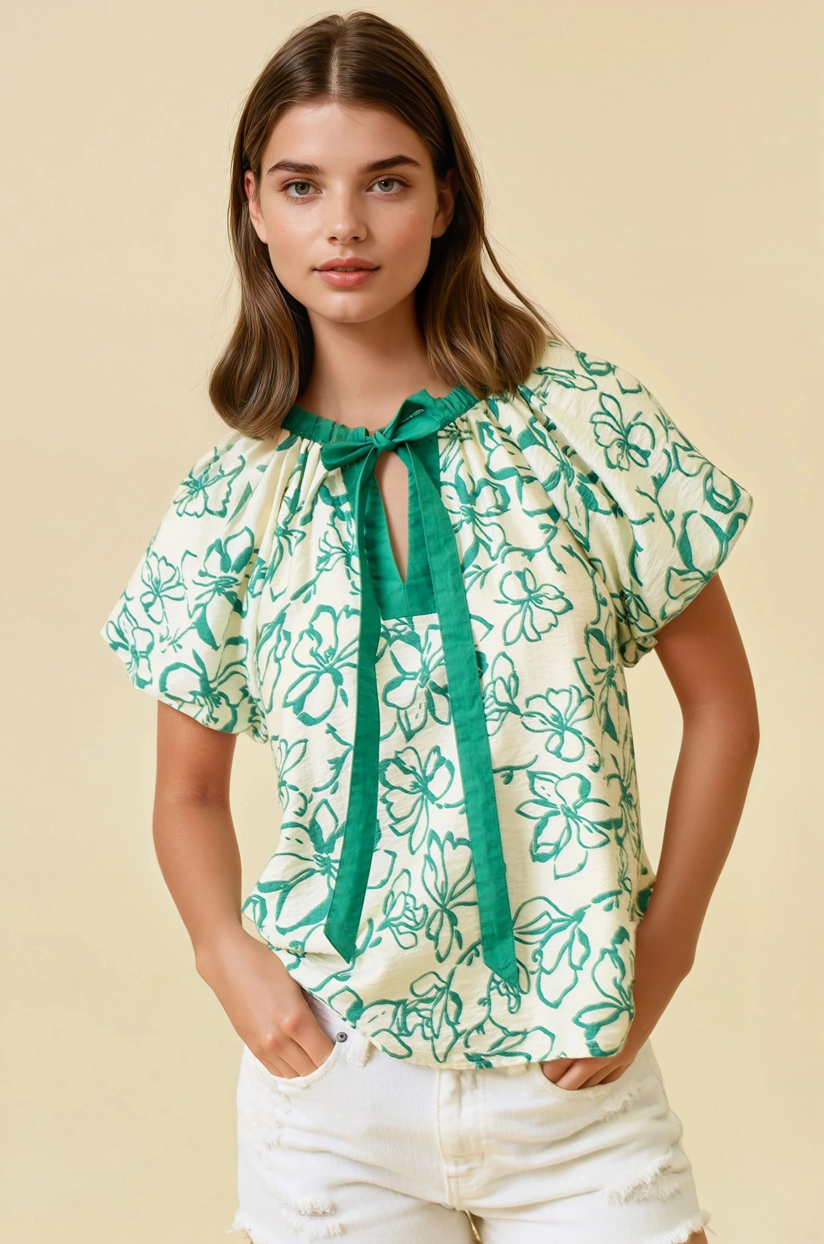 white and green floral short sleeve blouse with tie collar