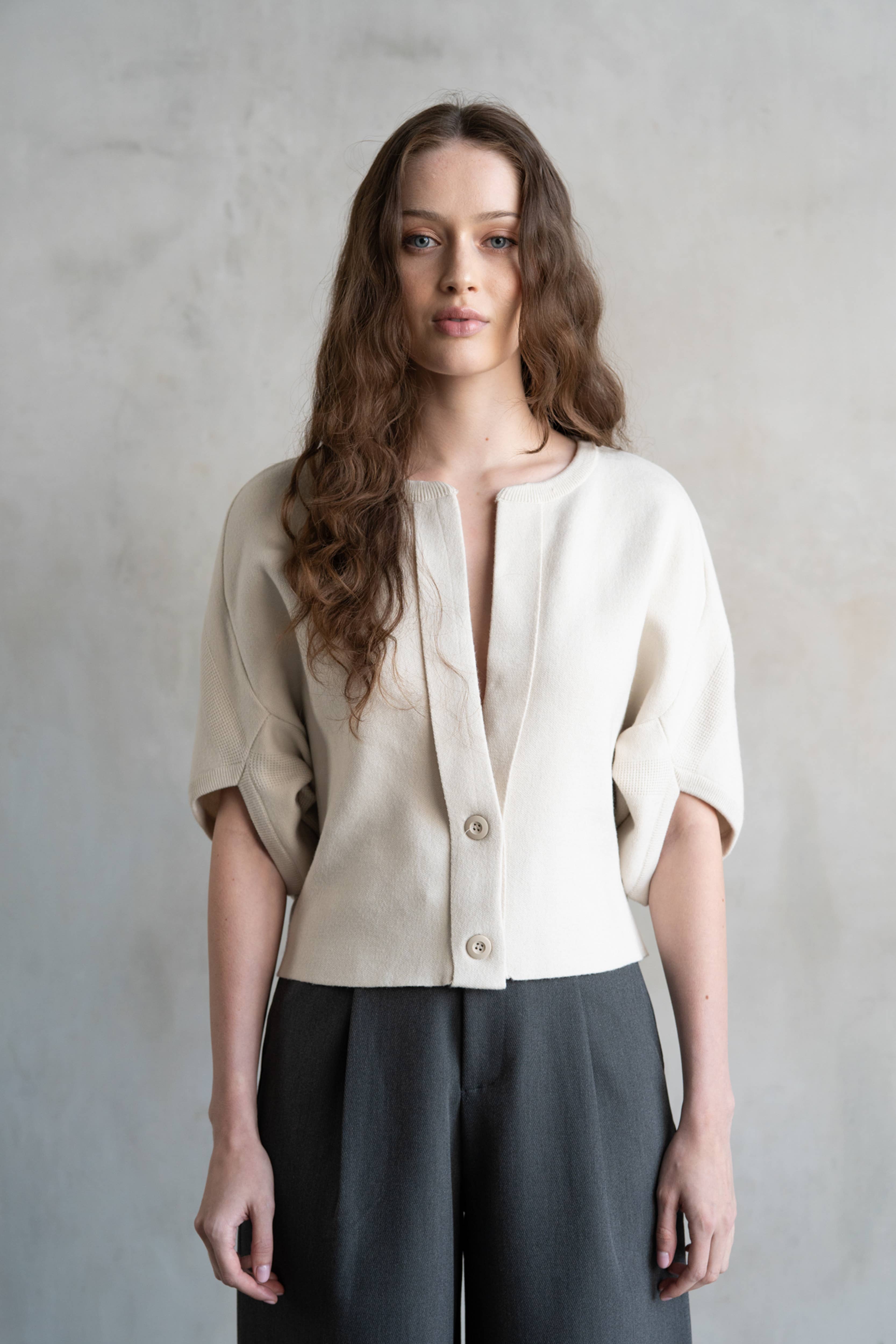 Ivory short sleeve cardigan with 2 large front buttons