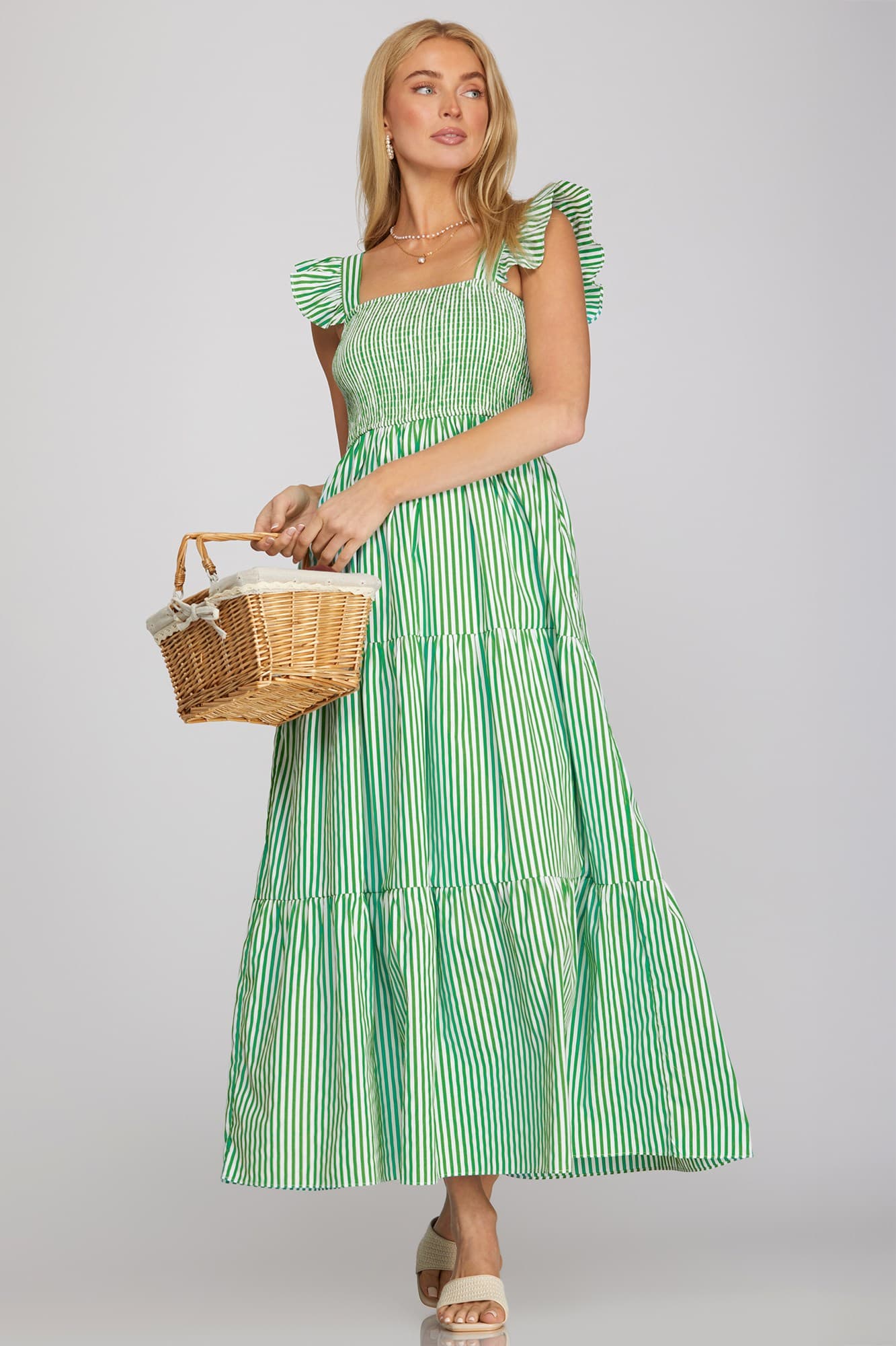 Green and white striped tiered maxi dress with ruffle sleeves and smocked bodice