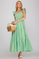 Green and white striped tiered maxi dress with ruffle sleeves and smocked bodice