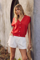 red v-neck button down cap sleeve sweater vest