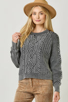 washed black long sleeve cable knit sweater