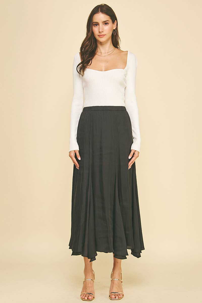 Long, lined black skirt with uneven bottom hem