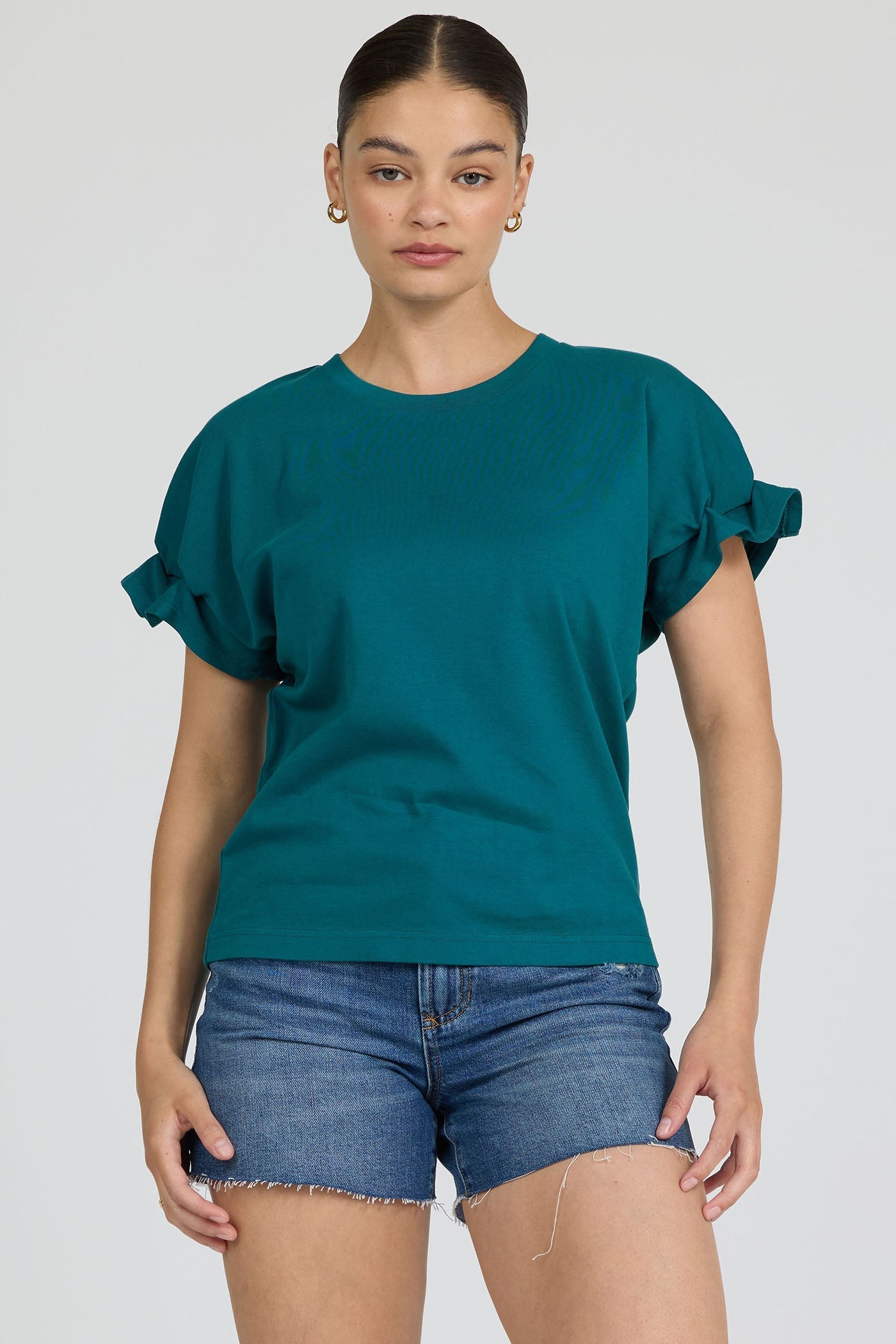 teal blouse with ruffle short sleeves and crewneck