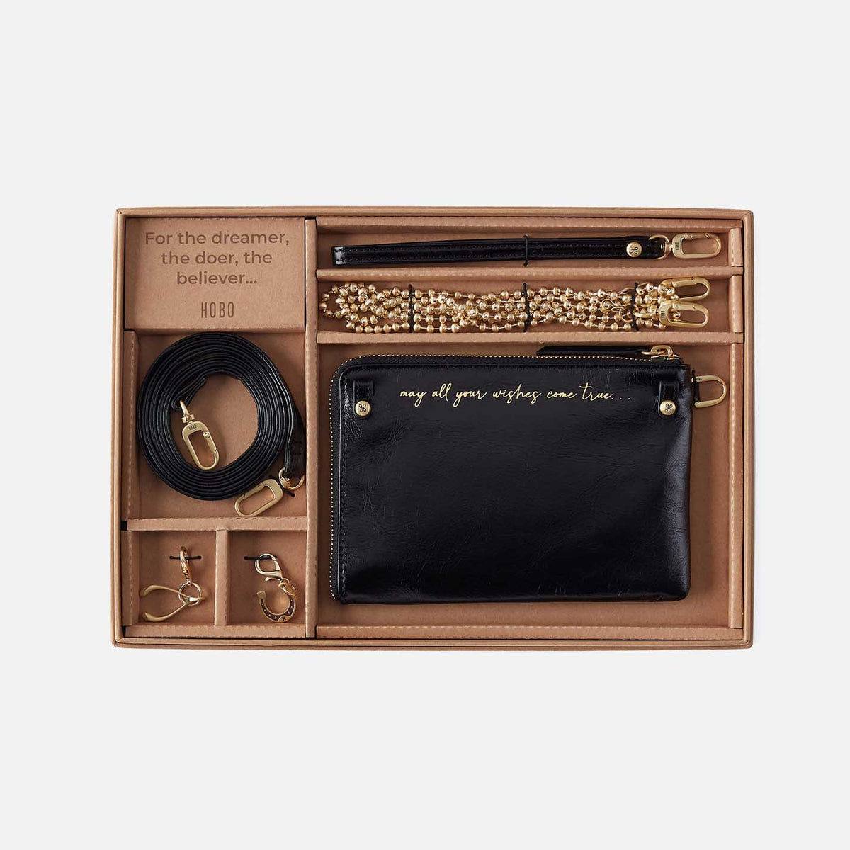 HOBO gift set with black pouch and additional straps and accessories.