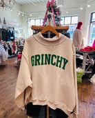 Oversized Mock Neck Sweatshirt with Green Grinchy Lettering