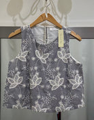 Sleeveless Top with floral pattern on black gingham