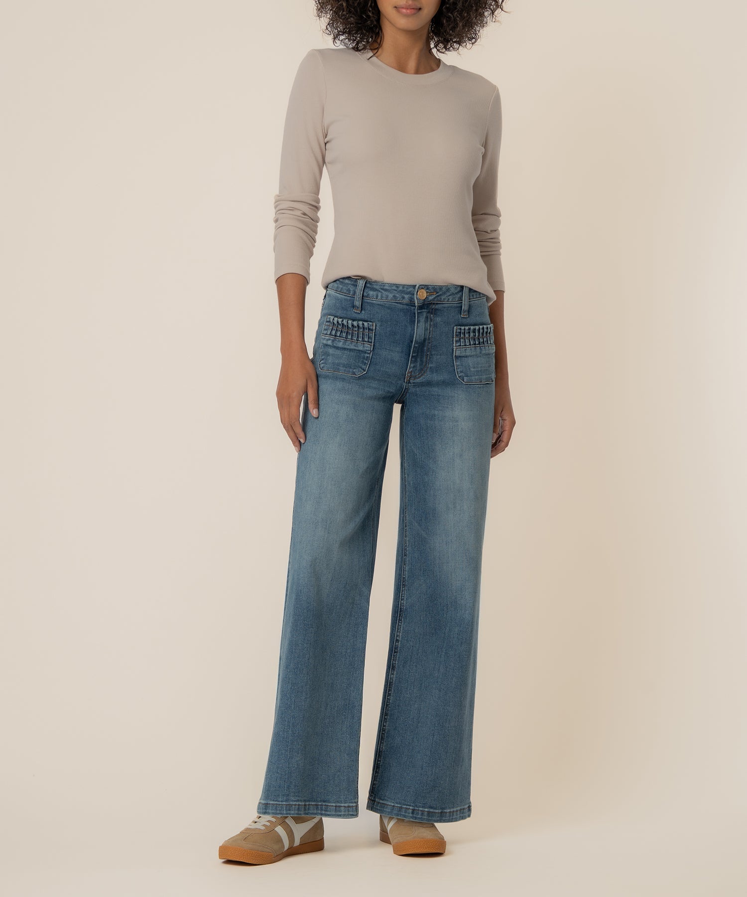 Medium wash wide leg denim with front pocket detail