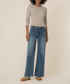 Medium wash wide leg denim with front pocket detail