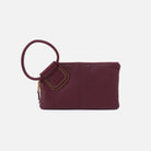 HOBO maroon clutch bag with a ring handle