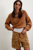 Tan rolled-cuff cargo shorts