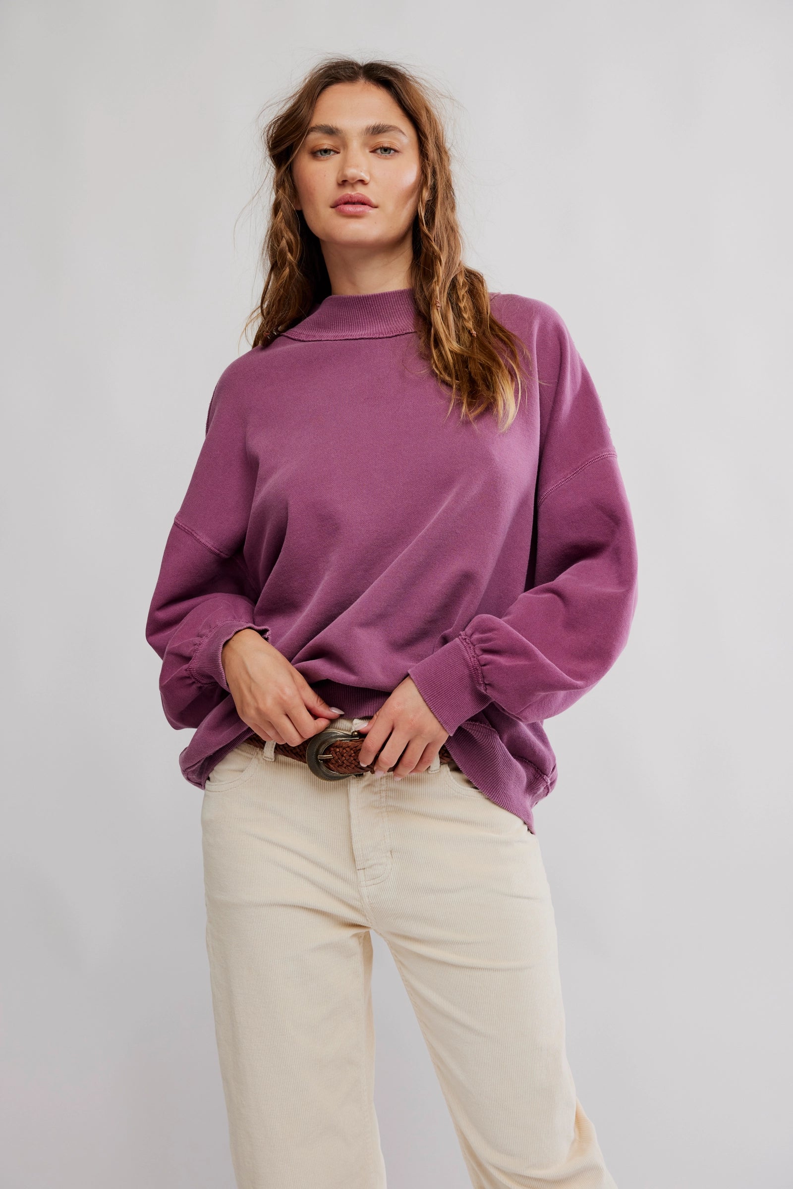 Oversized pullover from Free People, featured in a purple