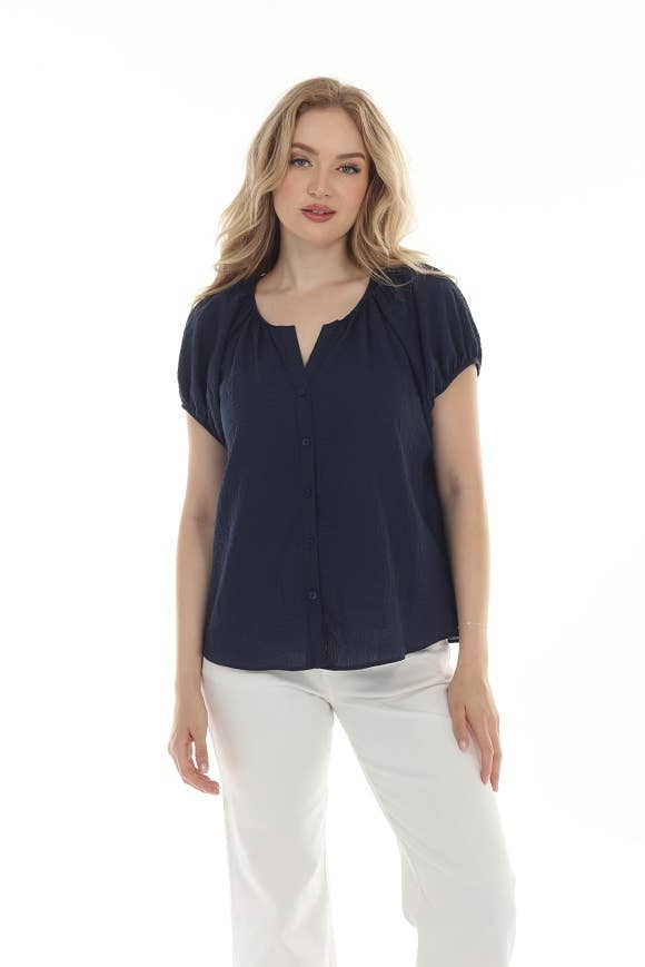 Lucy Button Top – A versatile blouse featuring a soft button-front design with gently gathered sleeves for a relaxed yet polished look. 