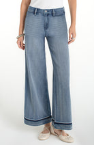 Liverpool Super Wide Leg in light blue denim with shadow cuff detail.