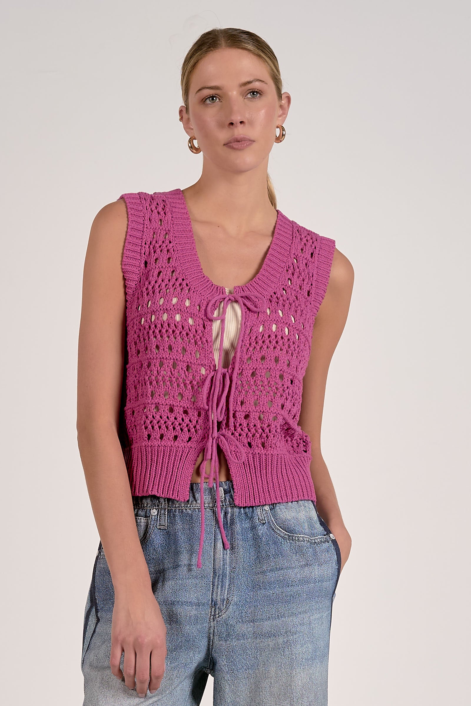 pink knitted sleeveless sweater vest with front tie
